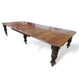 Victorian mahogany extending dining table on 6 decorative turned & reeded legs to castors, c/w 3