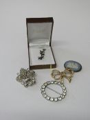 Silver floral brooch & 4 other costume brooches