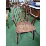 A 19th century Windsor armchair with elm seat. Estimate £50-80