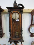 8 day 2 weight Vienna regulator wall clock, 130cms high. Estimate £100-150.