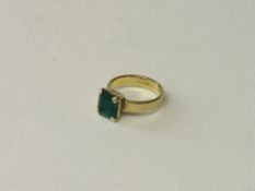 18ct gold ring with square cut emerald, approx 9mm x 8mm, size M, total wt 5.90gms. Estimate £1,