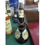 A 75cl bottle of de Bernard Grappa di Presecco & a 75cl bottle of Thibarine. Estimate £20-25.