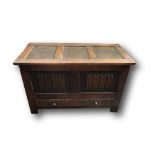 Carved oak blanket box with drawer to base, 96cms x 62cms x 45cms. Estimate £20-30.