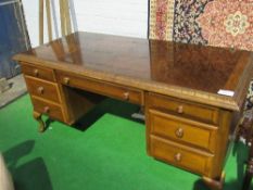 Alexander Julian Home Colours mahogany desk with parquetry top, centre frieze drawer flanked by 3