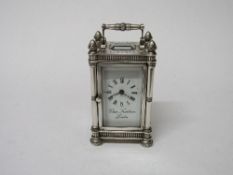 A silver cased small carriage clock by Chas. Frodsham, hallmarked London 1978, c/w key. 1 of only