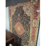 Blue ground Keshan carpet, 230cms x 160cms. Estimate £60-80.