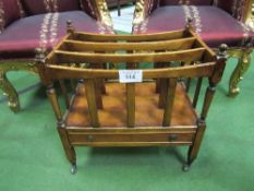 Edwardian mahogany Canterbury bookcase with lower drawer & castors. Estimate £30-50.