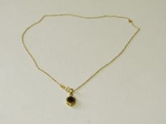 14ct gold & sapphire pendant & chain, total wt 3.6gms. Estimate £40-60.