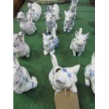 A set of 12 porcelain animal jugs, Country Friends by Hallie Greer c/w display shelves. Estimate £