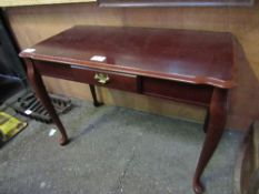 Modern mahogany reproduction occasional table with frieze drawer, 107cms x 56cms x 77cms.