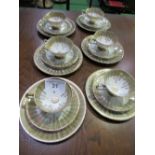 Colclough part tea set & German part tea set. Estimate £20-30.