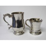 A silver tankard with scroll handle by F C Richards, Birmingham 1937, 11.16ozt & a silver cup,