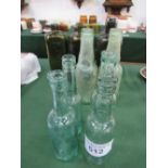 10 antique glass bottles. Estimate £5-10.