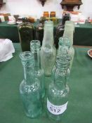 10 antique glass bottles. Estimate £5-10.