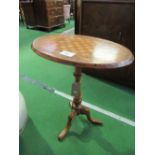 Early Victorian walnut inlaid games table on scroll form tripod. Estimate £30-50.