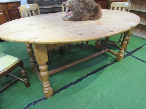 Drop-leaf oval shaped pine table on turned supports & stretcher, 200cms x 117cms (max) x 78cms. - Image 2 of 3