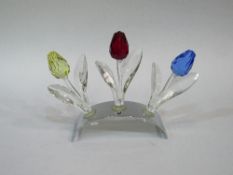 Complete Swarovski renewal set of 3 large coloured tulips with stand, all in original boxes with