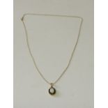 18ct gold opal & sapphire pendant on a 9ct gold fine chain necklace, opal size 8mm x 6mm, total wt