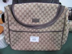 Gucci GG Supreme brown handbag, plus dust bag. Estimate £15-25.