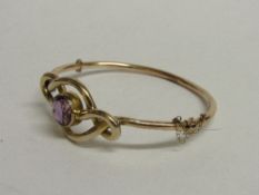 9ct (hallmarked) rose gold & amethyst bangle, weight 11.5gms. Estimate £175-200.