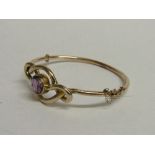 9ct (hallmarked) rose gold & amethyst bangle, weight 11.5gms. Estimate £175-200.