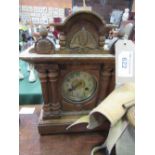 Pine cased mantel clock together with a canvas bag of WWII webbing belts & a copper bugle.