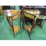 A pair of burr wood serpentine edged, ormolu mounted 3 legged display tables. Estimate £40-80.