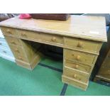 Pine small pedestal desk, 120cms x 58cms x 77cms. Estimate £40-60.