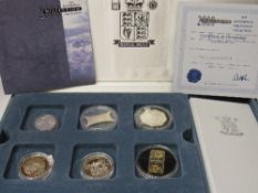 Royal Mint 24 coin 'Masterpiece' Millennium silver proof collection. Estimate £400-500.