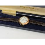 9ct gold cased lady's wristwatch, going order. Estimate £150-180.