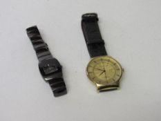 Swiss line black watch together with Christian Lars gold plated gent's watch. Estimate £10-20.