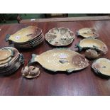 A qty of Crown Devon novelty piscatorial tableware, approx. 33 pieces. Estimate £80-120.