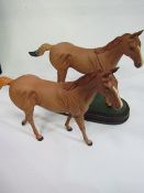 Beswick figurine of racehorse, 'Lammtarra' on stand & another without stand. Estimate £40-80.