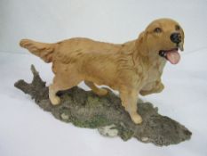 Golden Retriever figurine. Estimate £20-30.