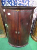 Mahogany bow front corner cupboard with double doors, 70cms x 49cms x 104cms