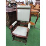 Mahogany framed American-style rocking chair. Estimate £40-60.