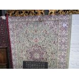 Green Keshan rug, 2.0 x 1.4. Estimate £70-90.
