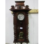 Mahogany Vienna wall clock with enamel dial, 115cms x 42cms. Estimate £20-40.