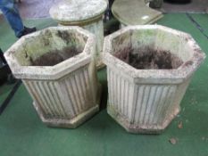 Pair of octagonal planters, 55cms x height 53cms. Estimate £80-100.