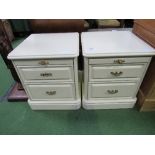 Pair of cream bedside cabinets with brush slides, 47cms x 47cms x 55cms. Estimate £10-20.