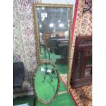 Oval bevel edged mirror with painted fruit frame, height 85cms & a gilt framed bevel-edge wall