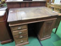 Oak pedestal sloped-top Clerk's desk with 4 drawers on 1 side & cupboard to other, 115cms x 64cms