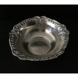 Silver chase & repousse bowl, hallmarked, 5inch diameter, weight 52gms. Estimate £25-35.