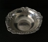 Silver chase & repousse bowl, hallmarked, 5inch diameter, weight 52gms. Estimate £25-35.