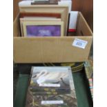 Box containing 8 various frames, 5 trinket trays & 5 ethnic block prints. Estimate £20-30.