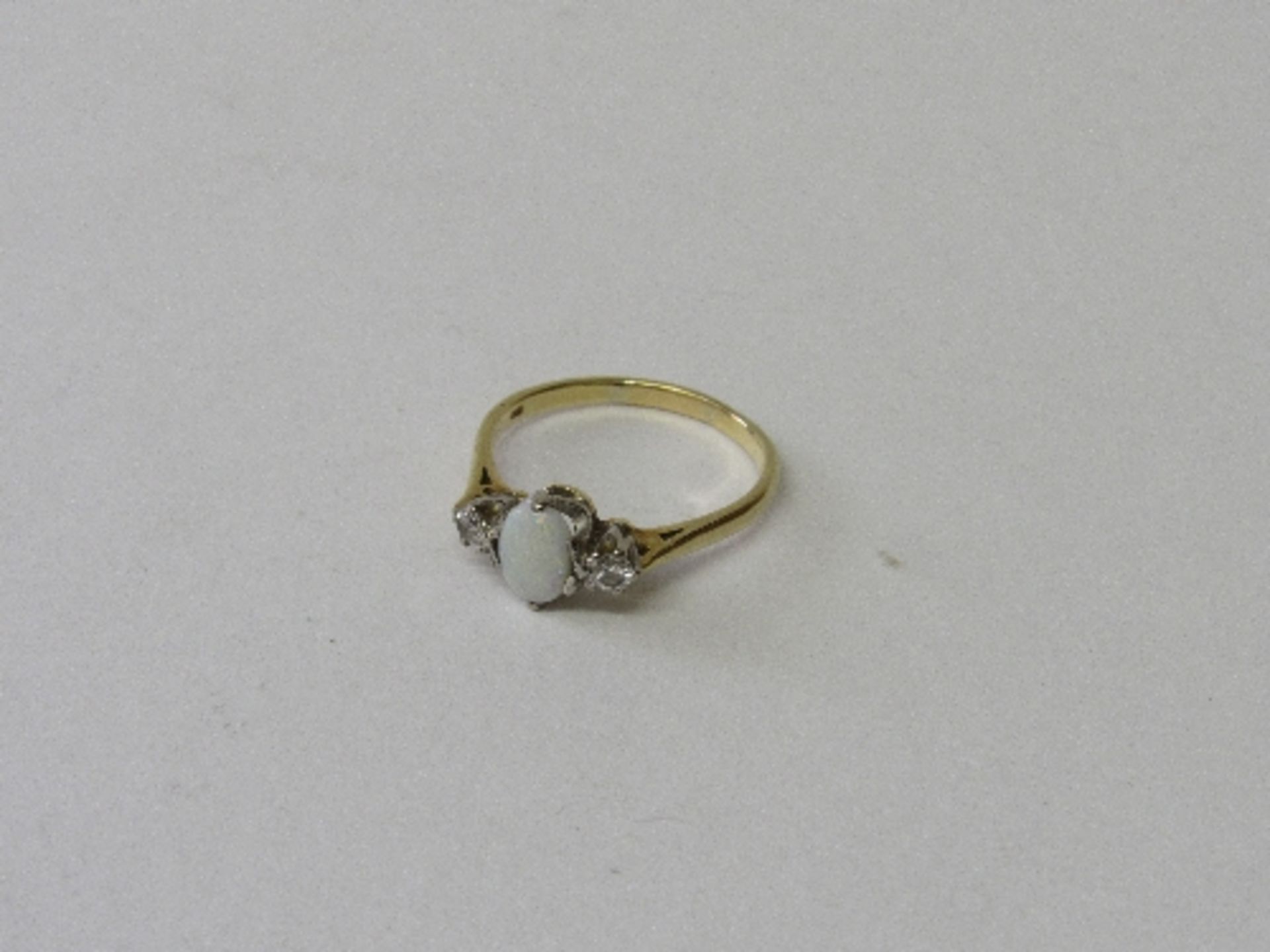 18ct gold & opal diamond ring, size N 1/2, weight 3.3gms. Estimate £100-120.