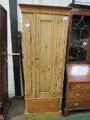 Pine wardrobe with drawer to base, 78cms x 43cms x 194cms. Estimate £20-40.