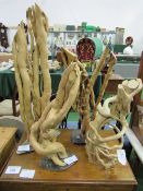 4 pieces of driftwood sculptures. Estimate £20-30.