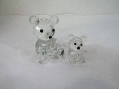 Swarovski crystal large bear, boxed, code 010009 & bear mini, boxed, code 012262. Estimate £40-60.