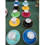 10 Tuscan coloured coffee cans & saucers. Estimate £20-30.
